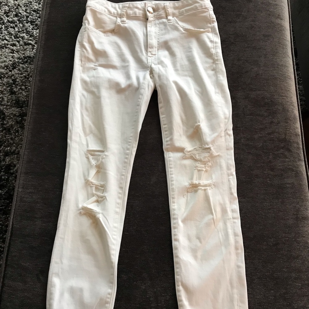Distressed white jeggings